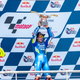 Alex Rins (center) flanked by Valentino Rossi (left) and Jack Miller (right).